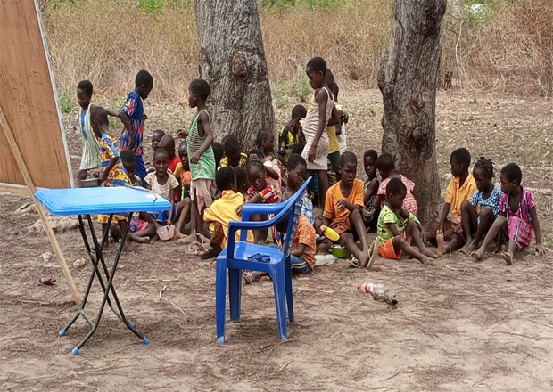 Children gathered for a BASU community education and wellbeing activity